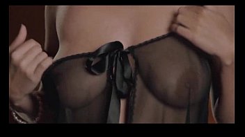 Redheaded Dutch girl shakes her natural tits while masturbating her pussy
